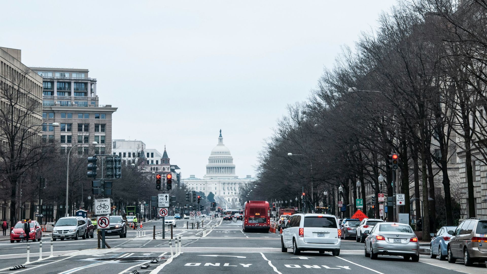 vehicles on road during daytime