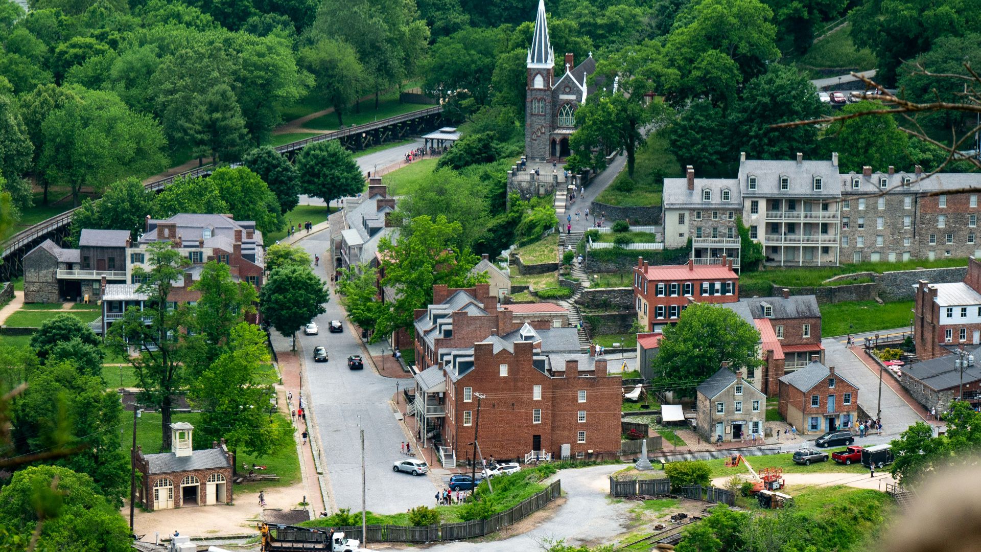 trees near cathedral and buildings