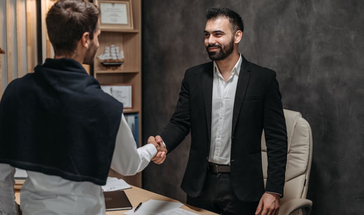 Lawyer with a Client in an Office