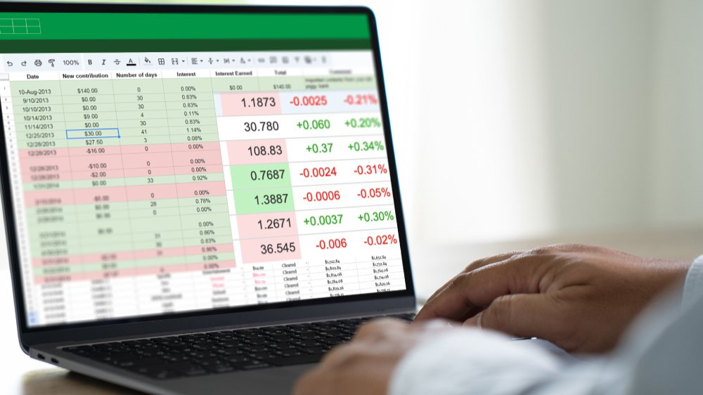Businessman working with data and graphs in spreadsheet documents