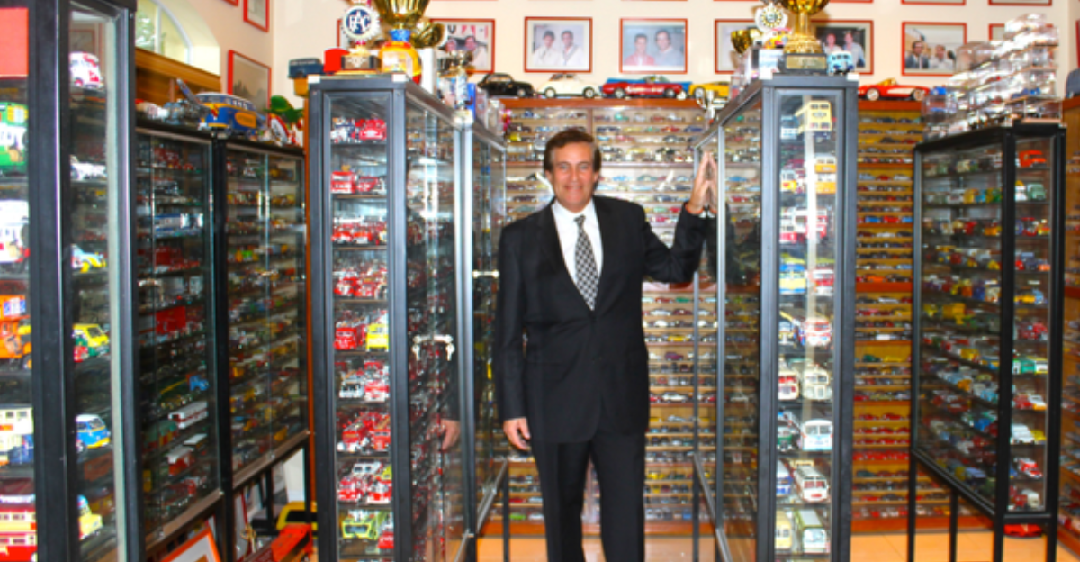  Sergio Goldvarg poses with part of the two times GUINNESS WORLD OF RECORDS Award car collection