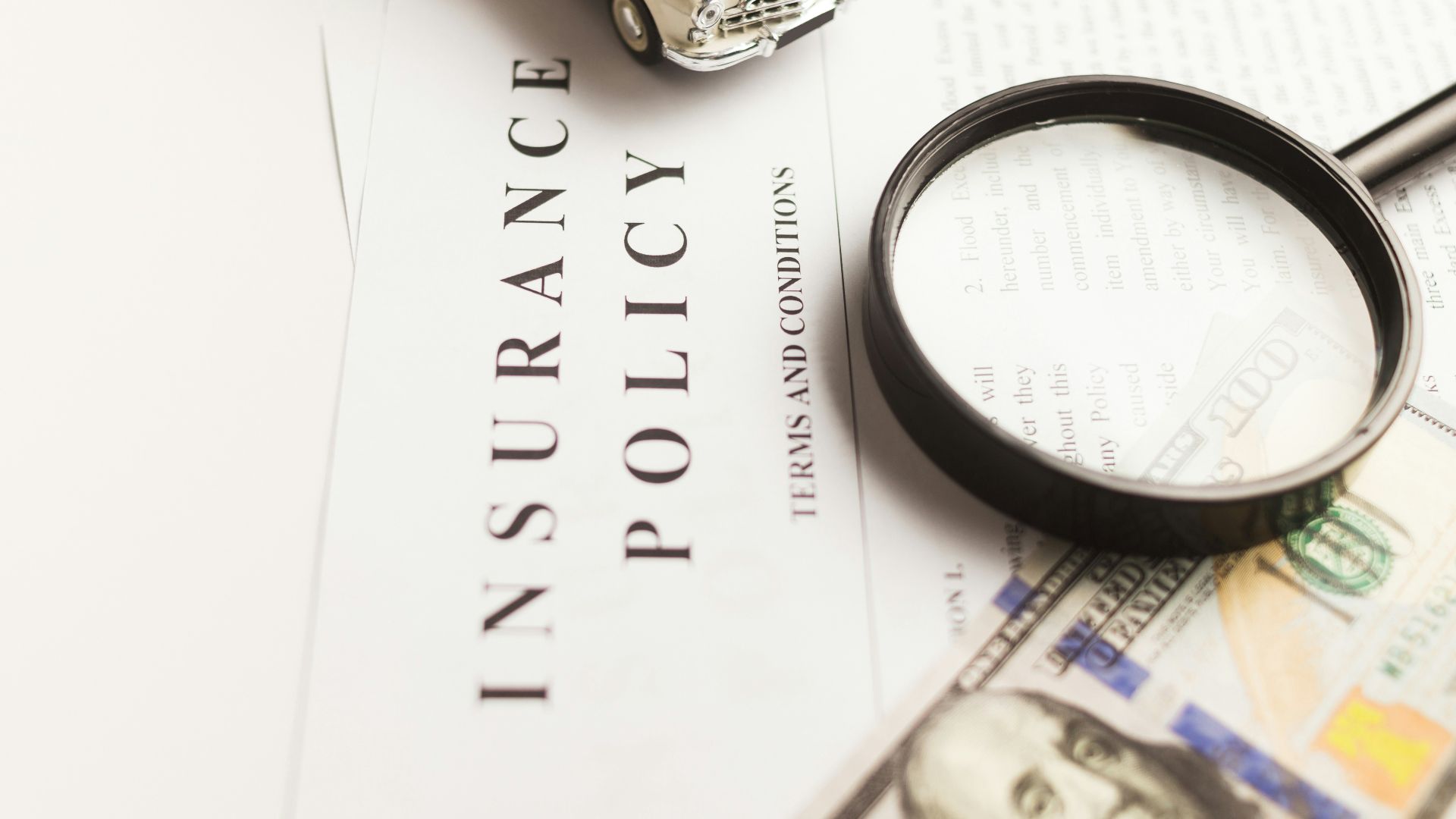 a magnifying glass sitting on top of a piece of paper