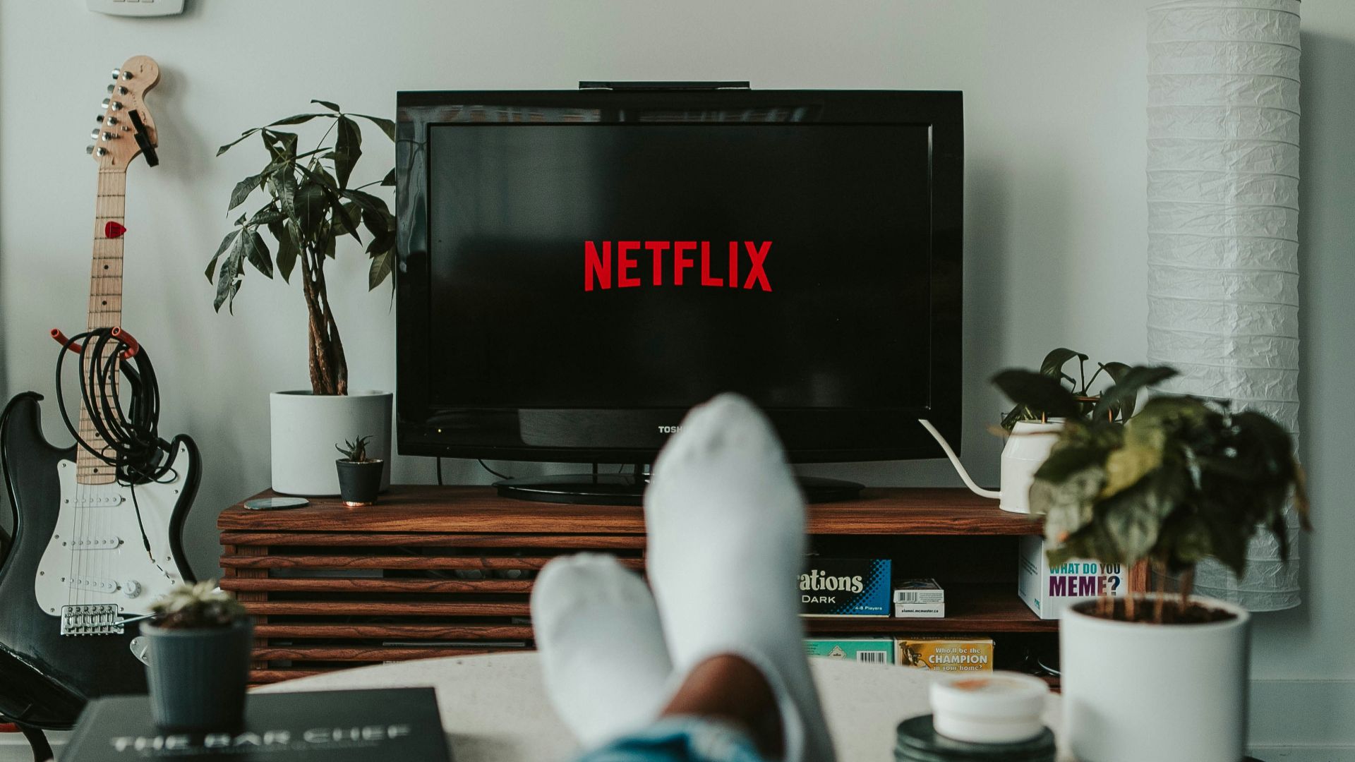 black flat screen tv turned on displaying 11