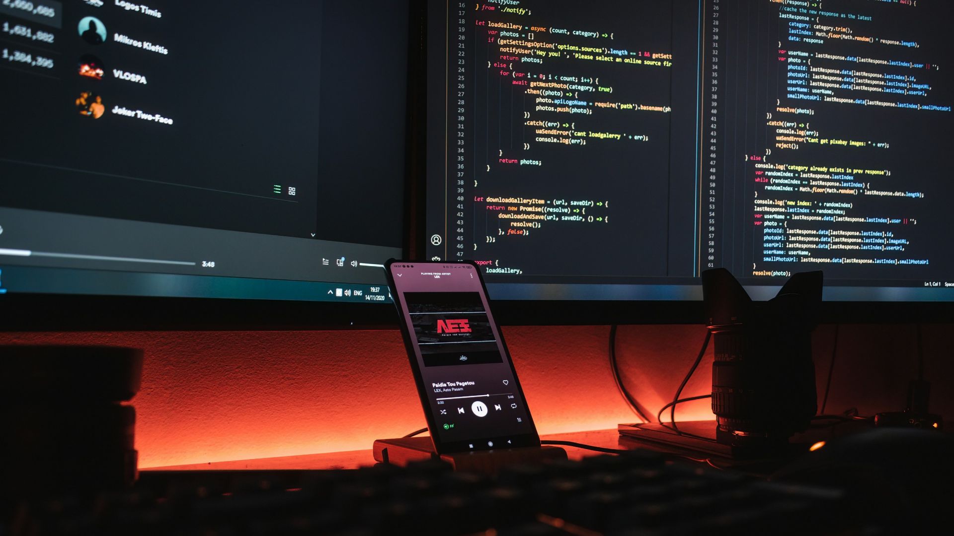 black remote control on red table