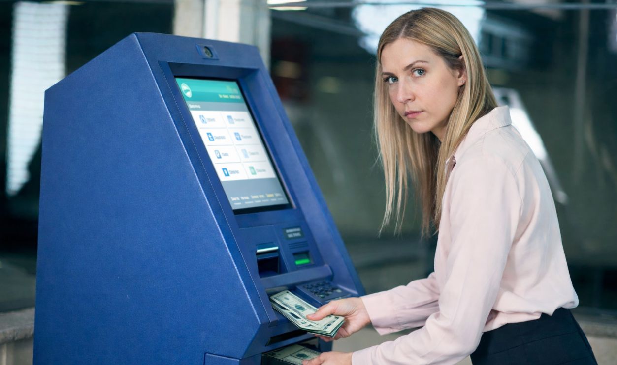 Woman using an ATM