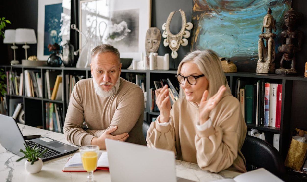 Man and Woman Sitting at Table