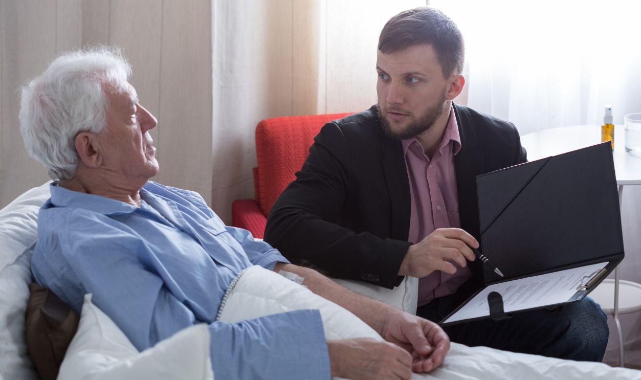 Terminal patient talking with notary about his last will