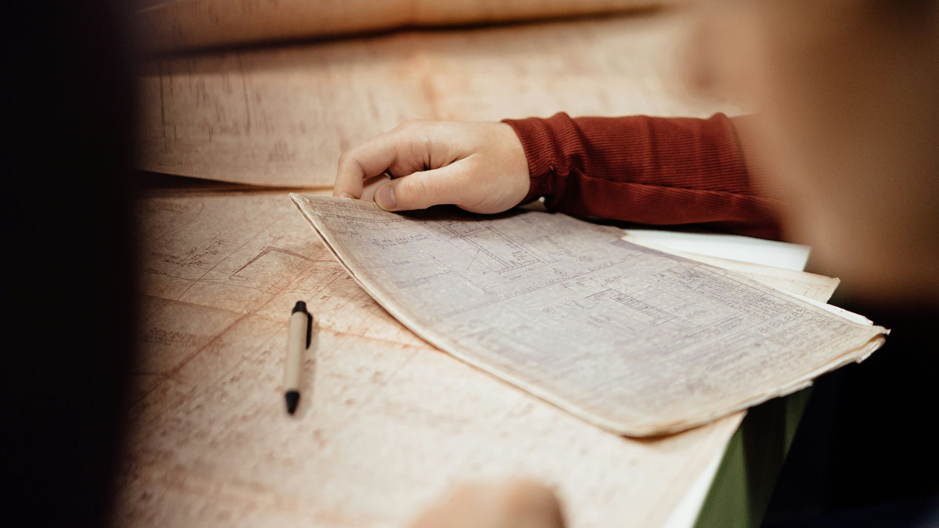 Someone is looking at old paper.