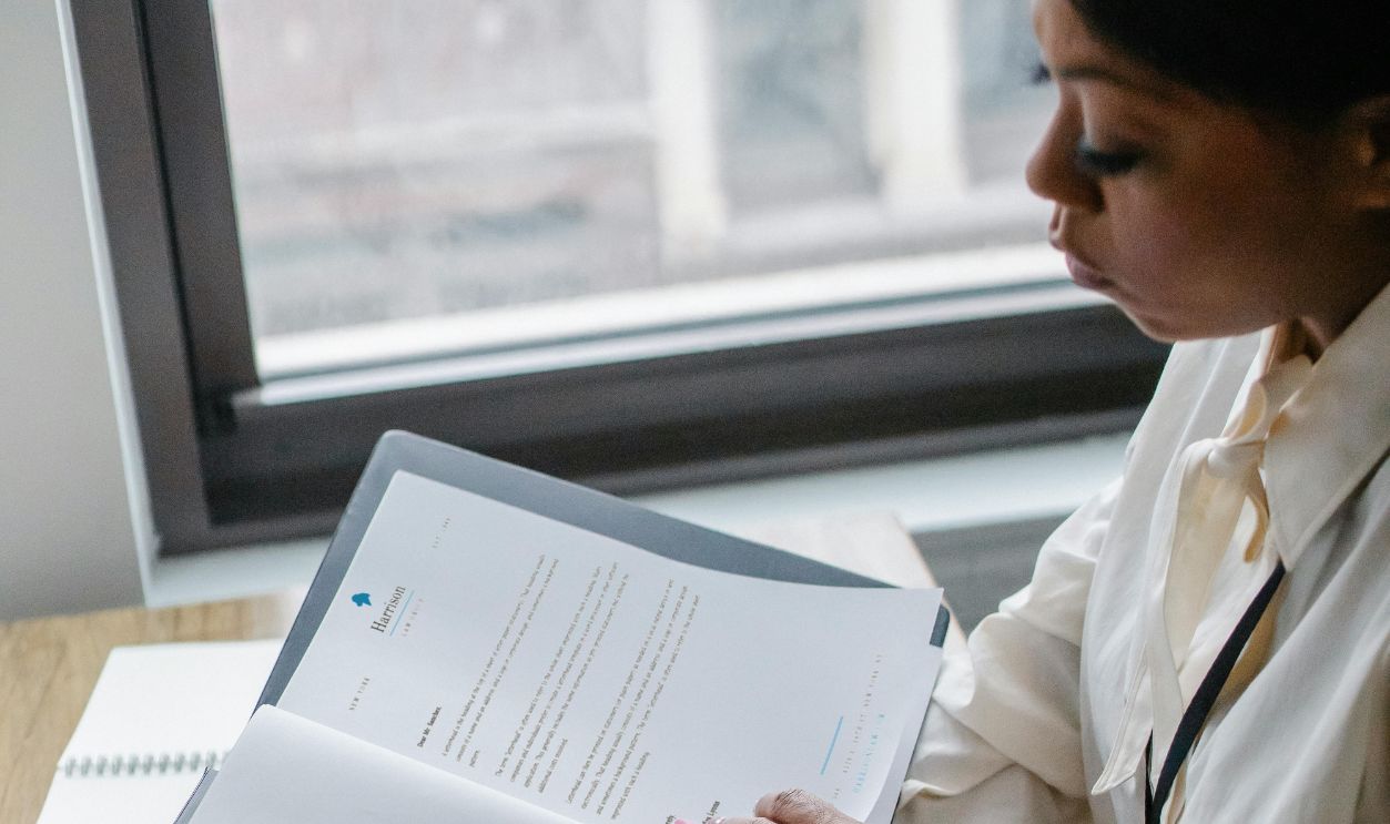 woman looking at documents