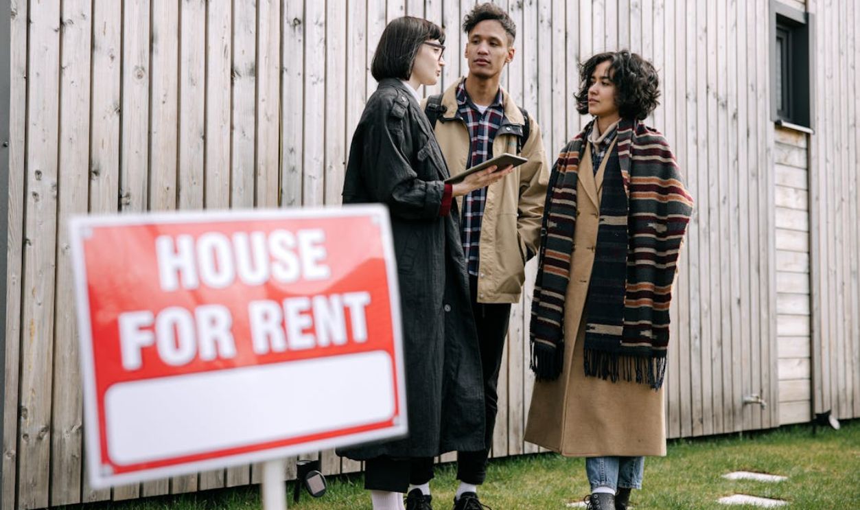 Interracial Couple Talking to Real Estate Agent