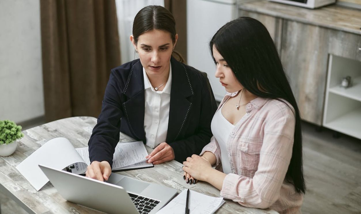 Women Looking at a Laptop Together