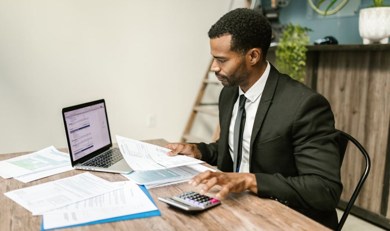 A Man Sitting at the Table