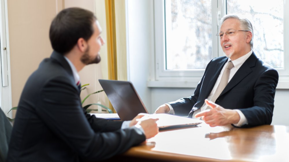 Portrait Photo of a man during a job interview in office