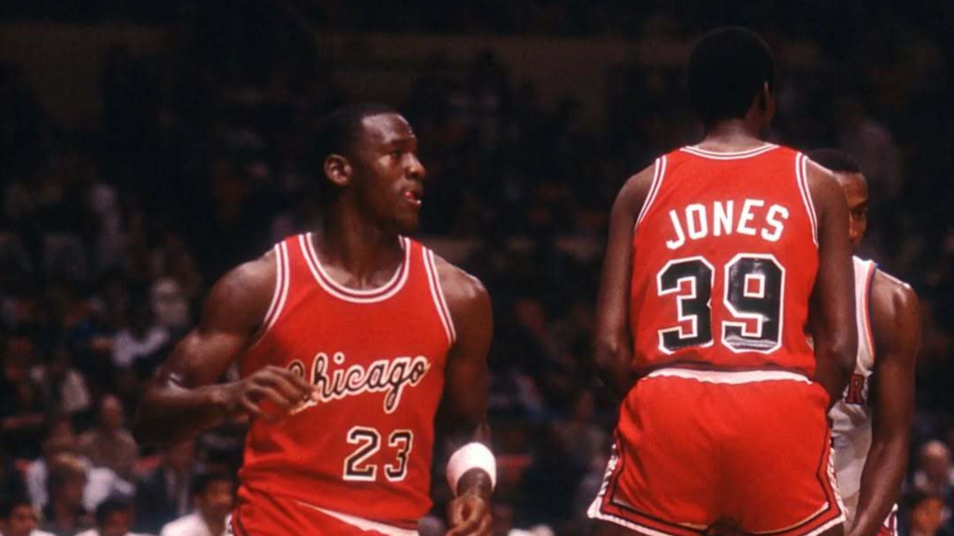Michael Jordan setting the Chicago Bulls offense during one of his first NBA games, an exhibition game in Madison Square Garden against the New York Knicks