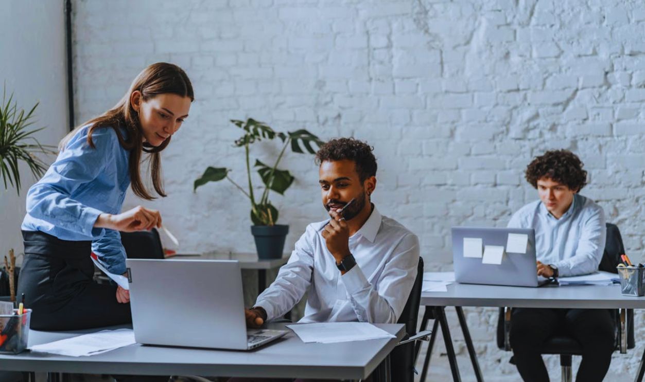 Coworkers Sharing Ideas At Work