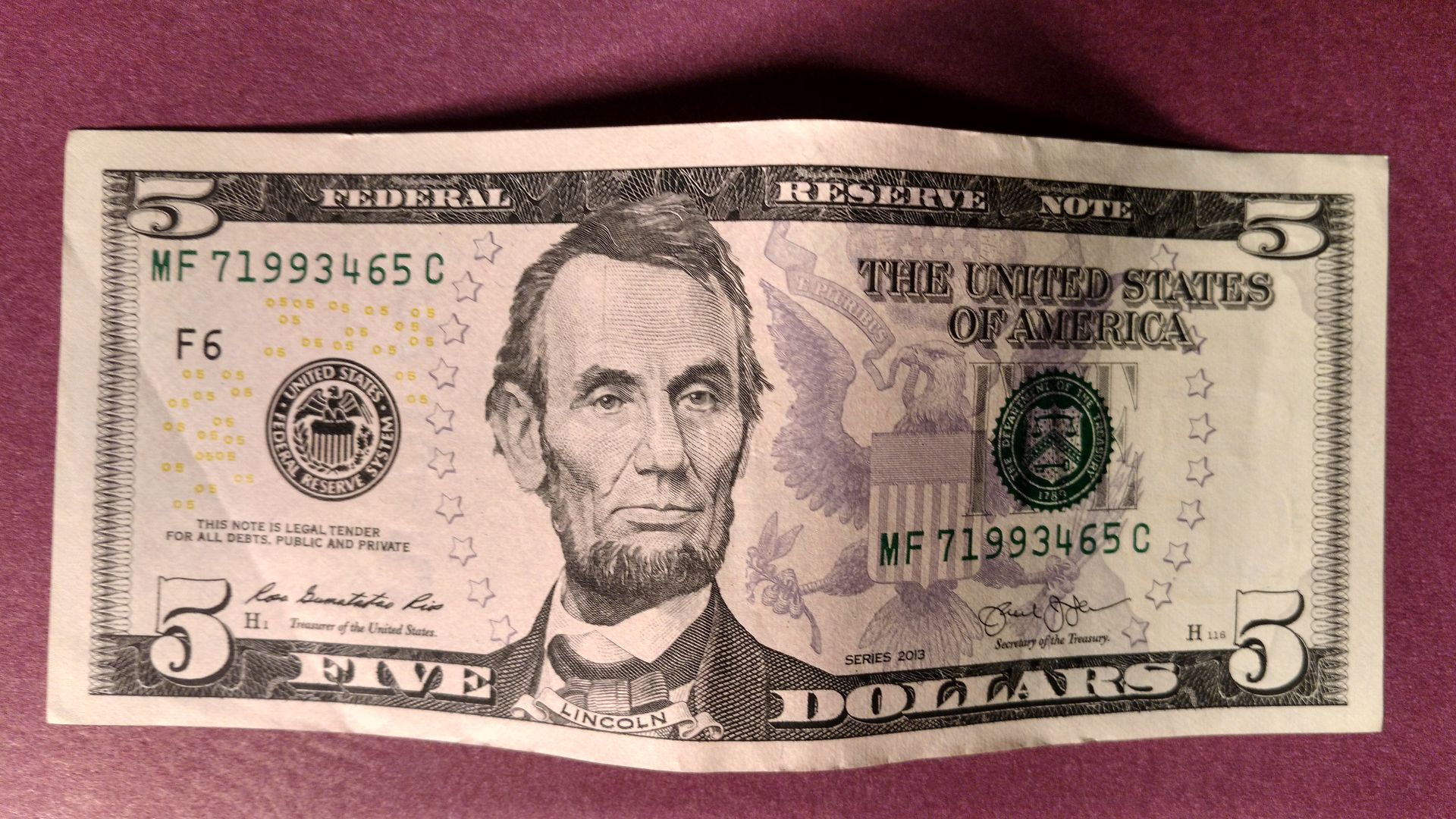 This is an American five dollar bill.