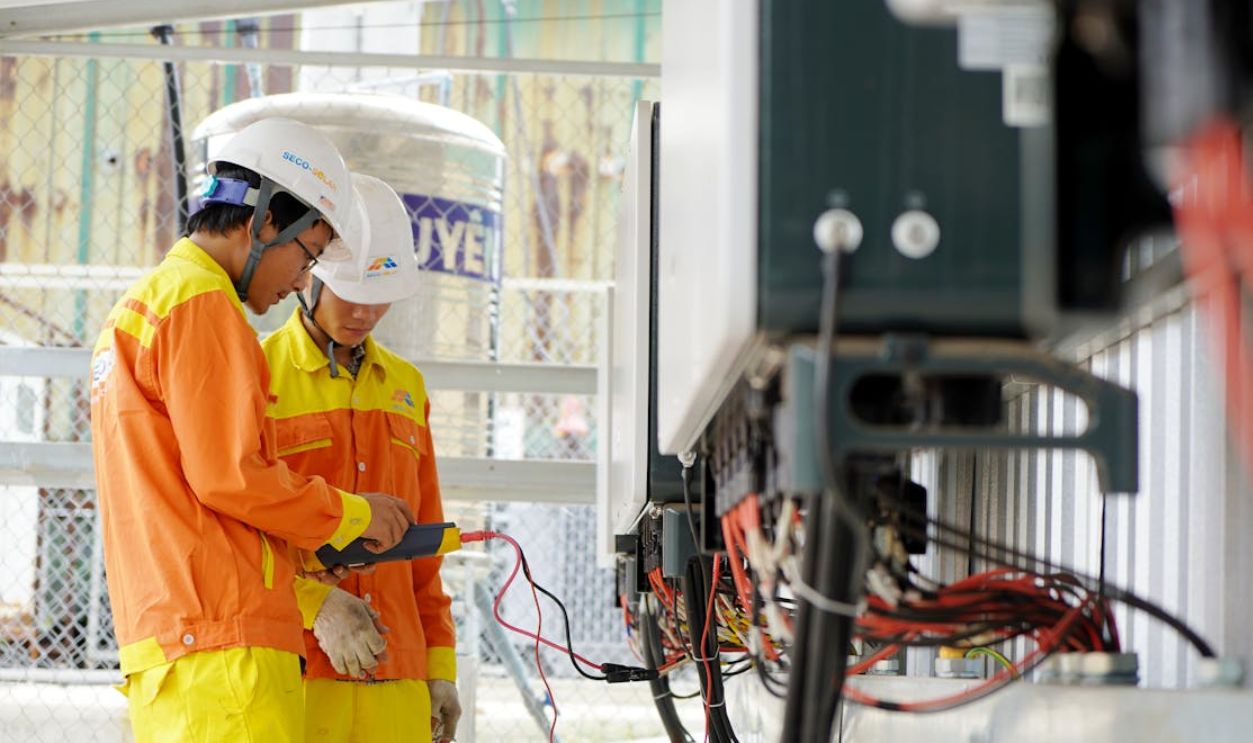 Men Working with Electrical Wires