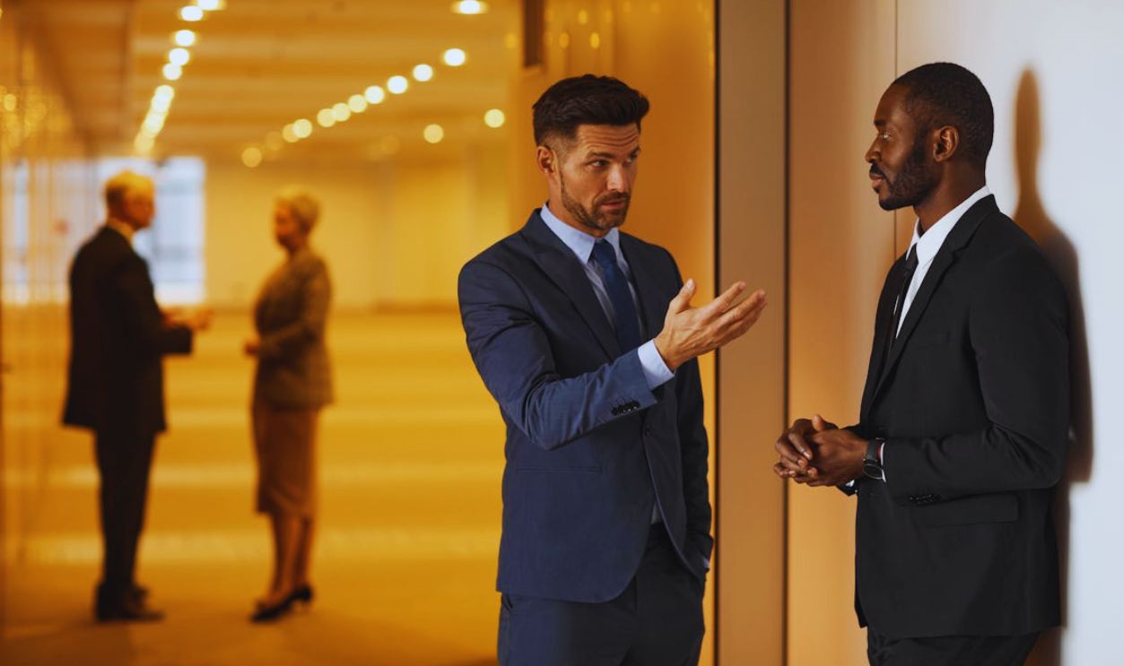 Men in Suits having Conversation