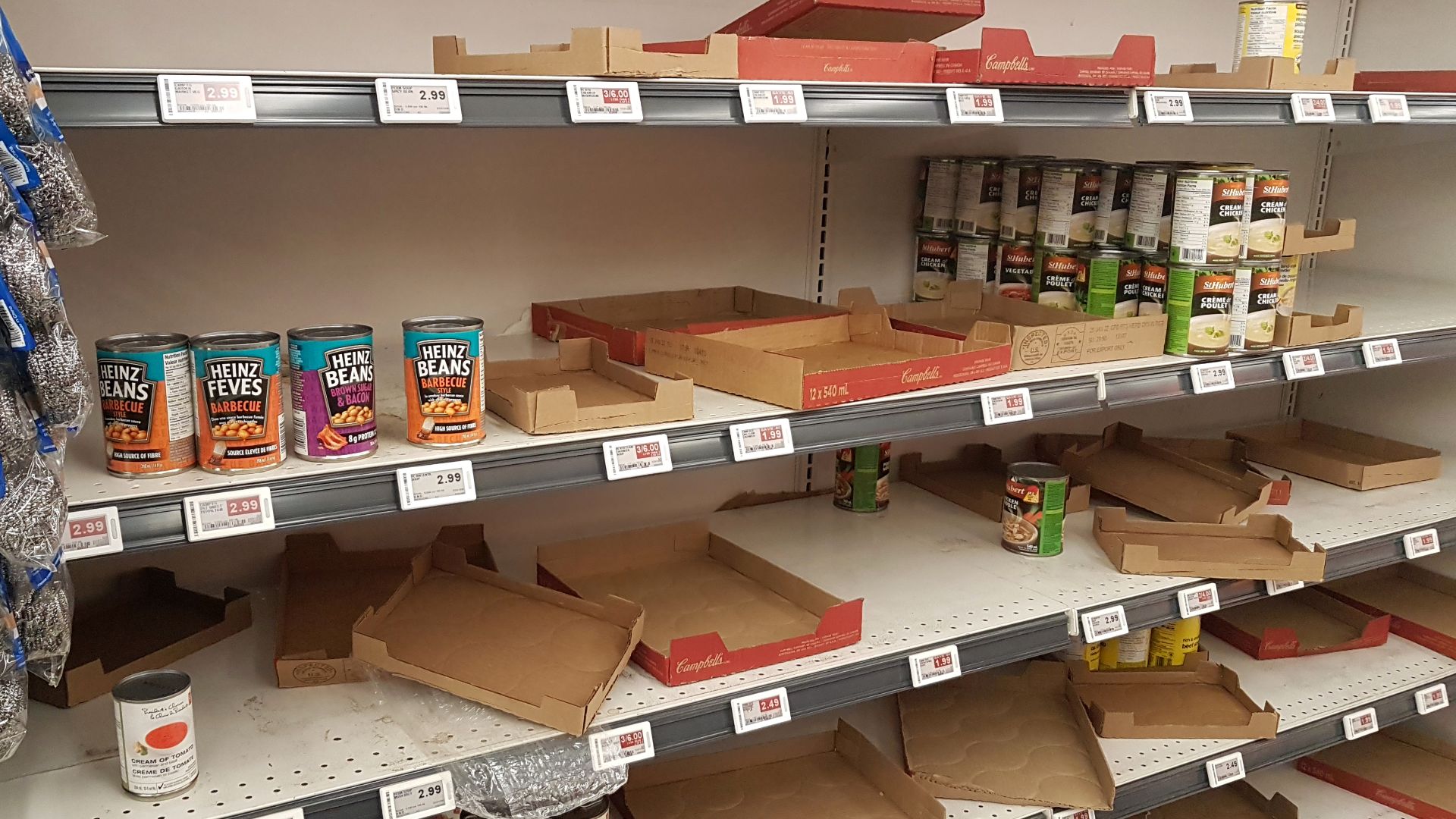 Mostly empty shelves of an Atlantic Superstore supermarket of Halifax, Nova Scotia, Canada, on 13 March 2020 due to panic buying related to the COVID-19 and coronavirus outbreak.