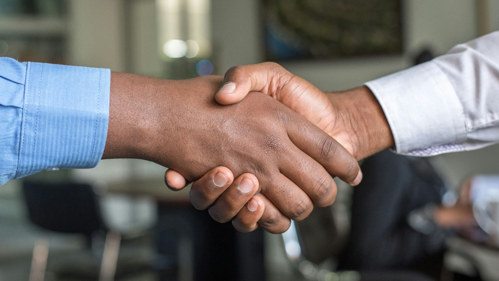 two people shaking hands