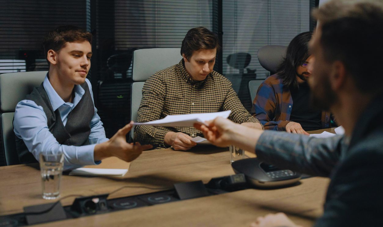 A Man Handing Out Documents