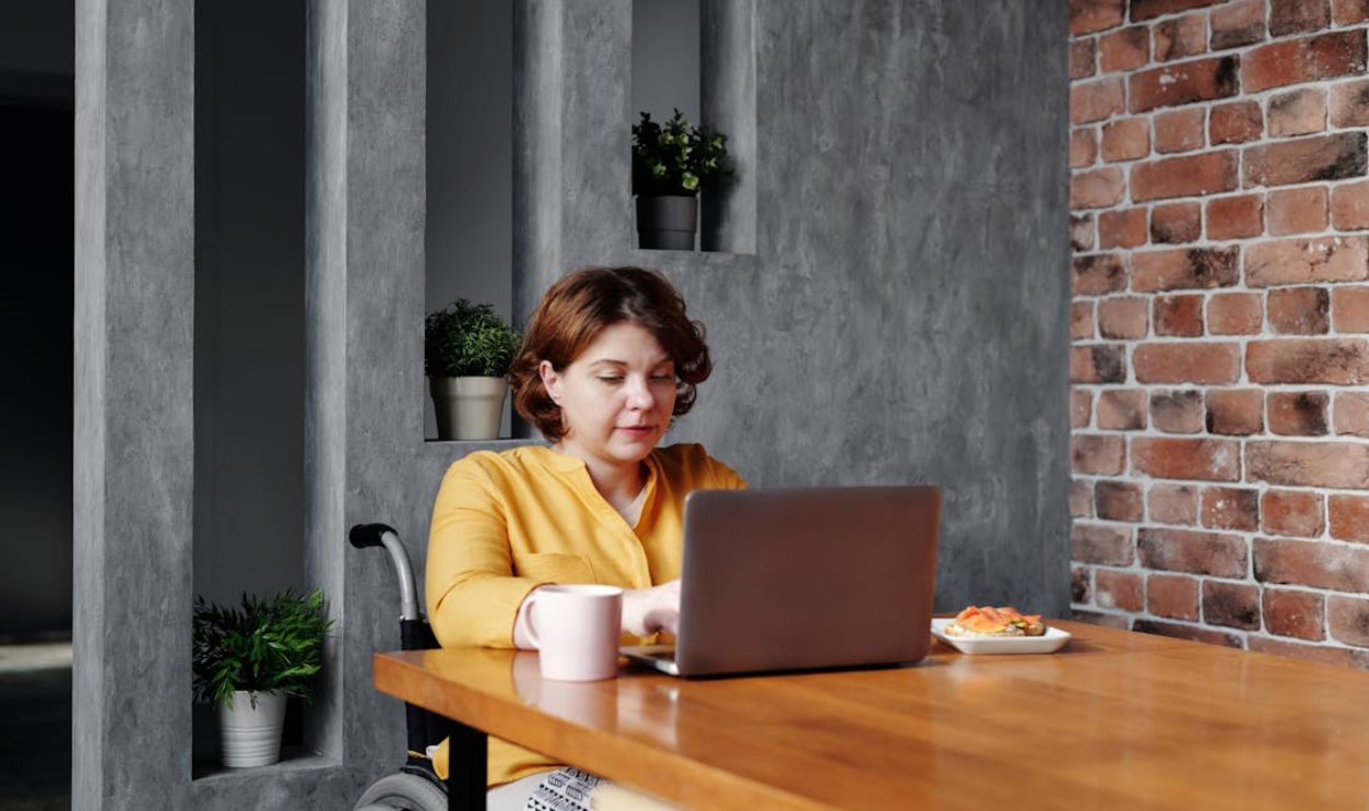 Photo of Woman Using Laptop