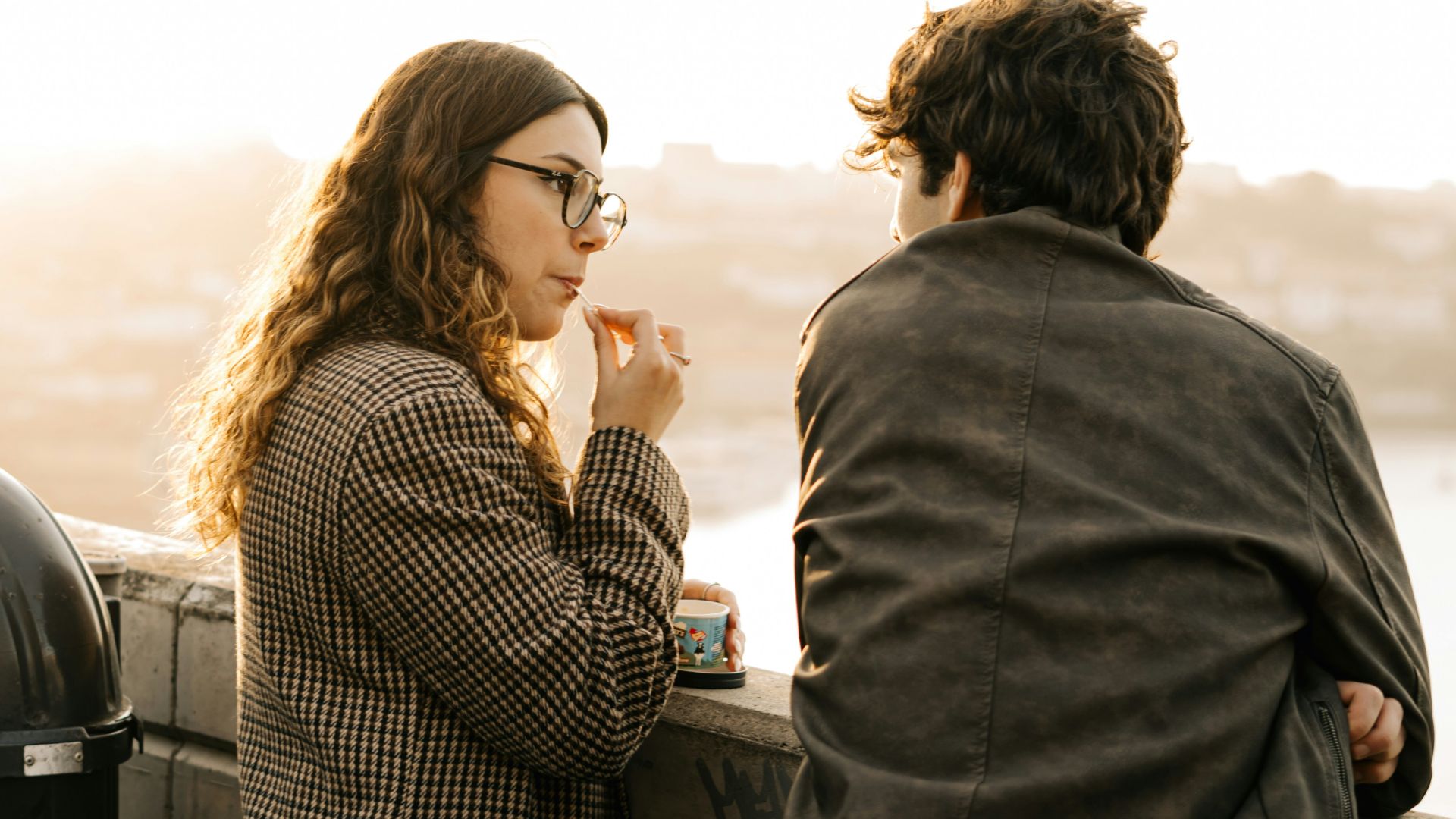 A man and a woman standing next to each other