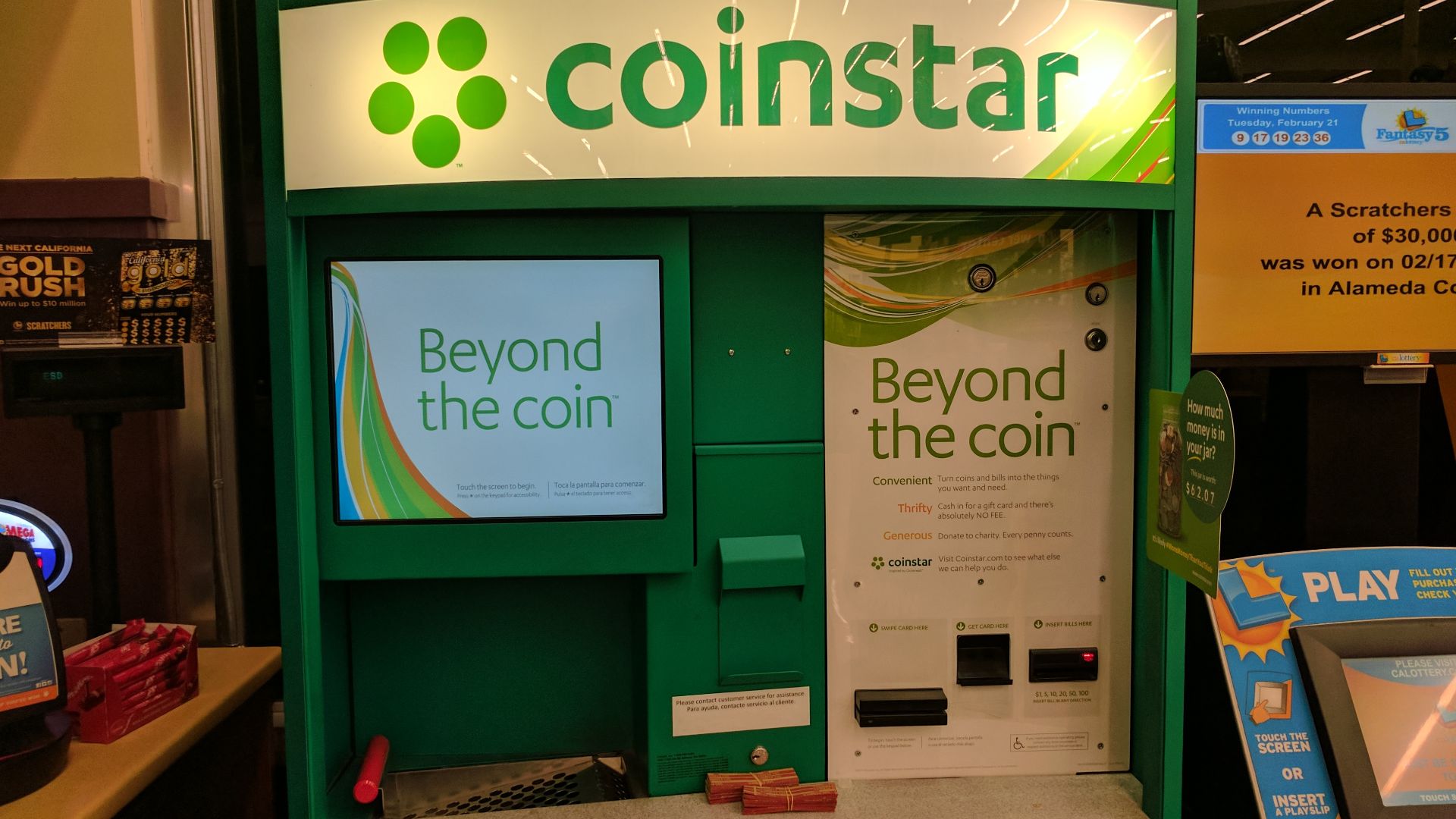 a coin-sorting machine exchanging loose change for scrips or gift vouchers, in the United States of America. See also a video of the machine in action.