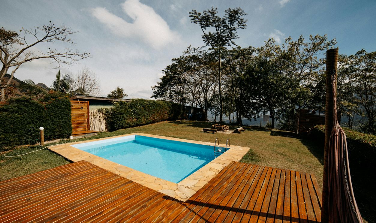 A Swimming Pool beside a Wooden Plank