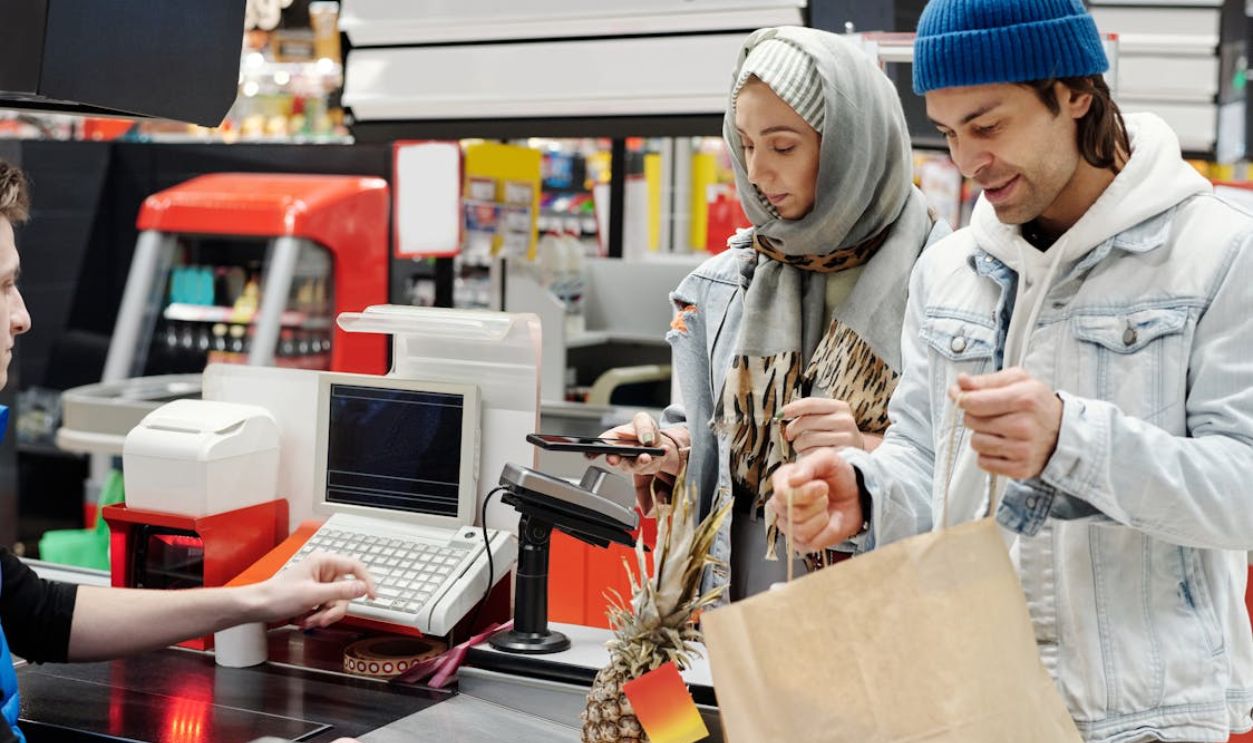 Couple Buying Groceries at a Supermarket