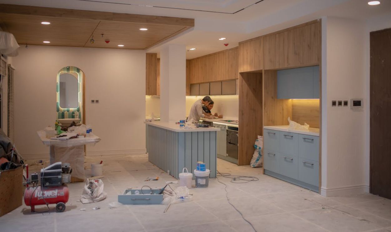Men Working Inside a House Under Repairs