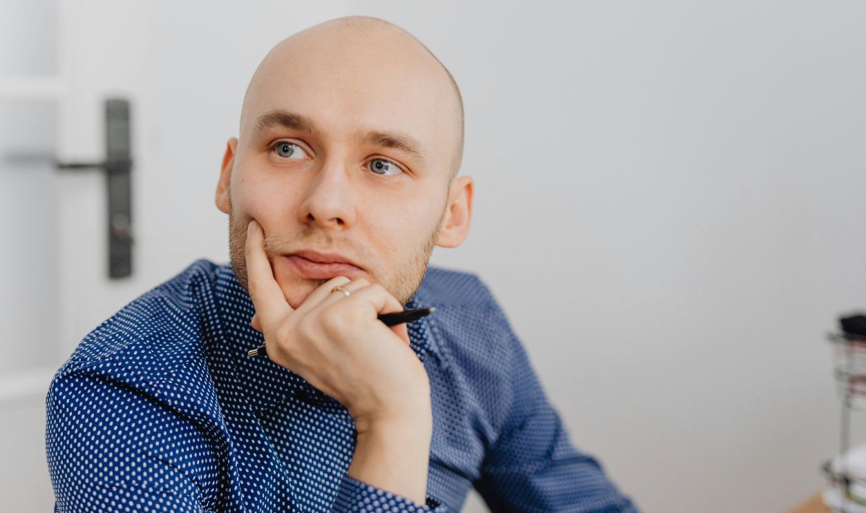 A Man Leaning on His Hand