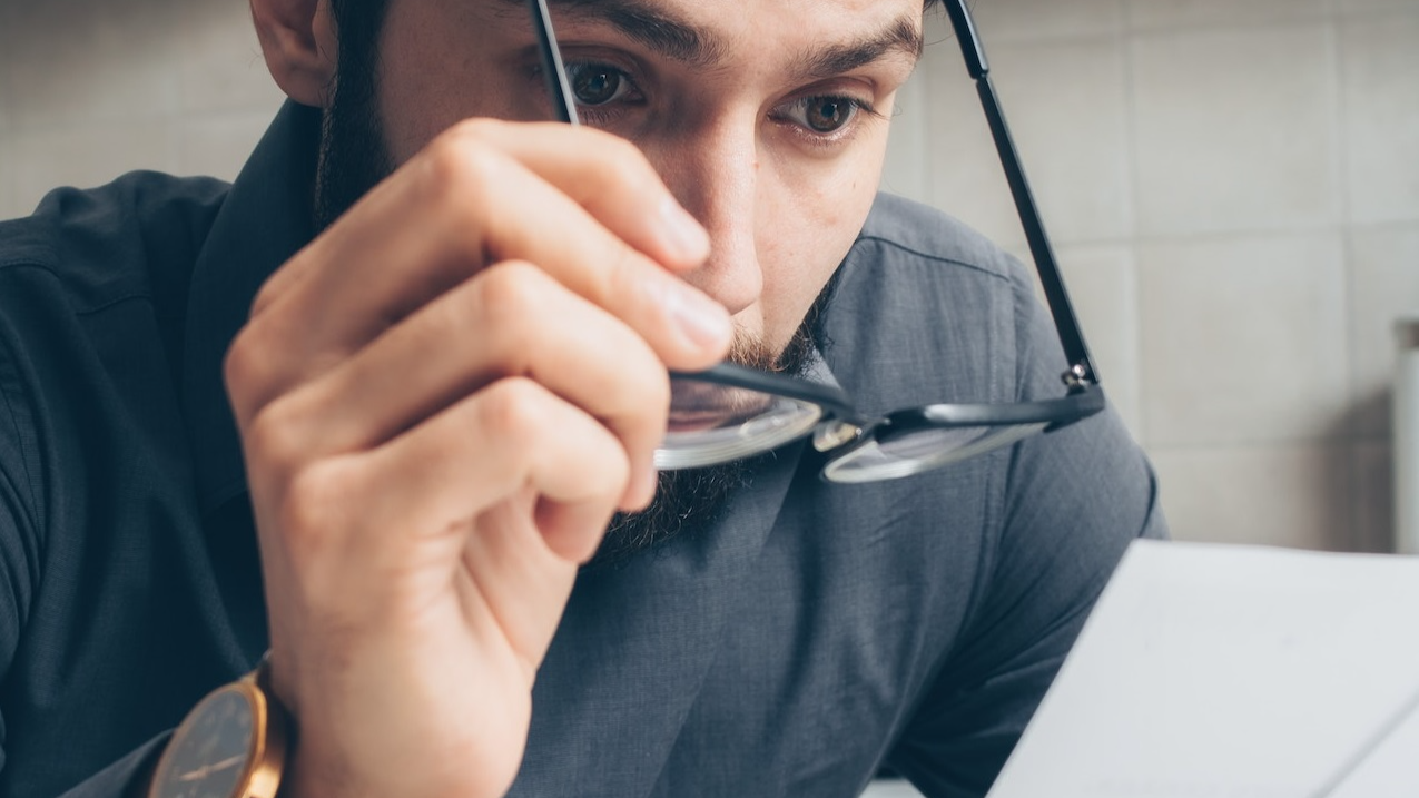 man checking documents