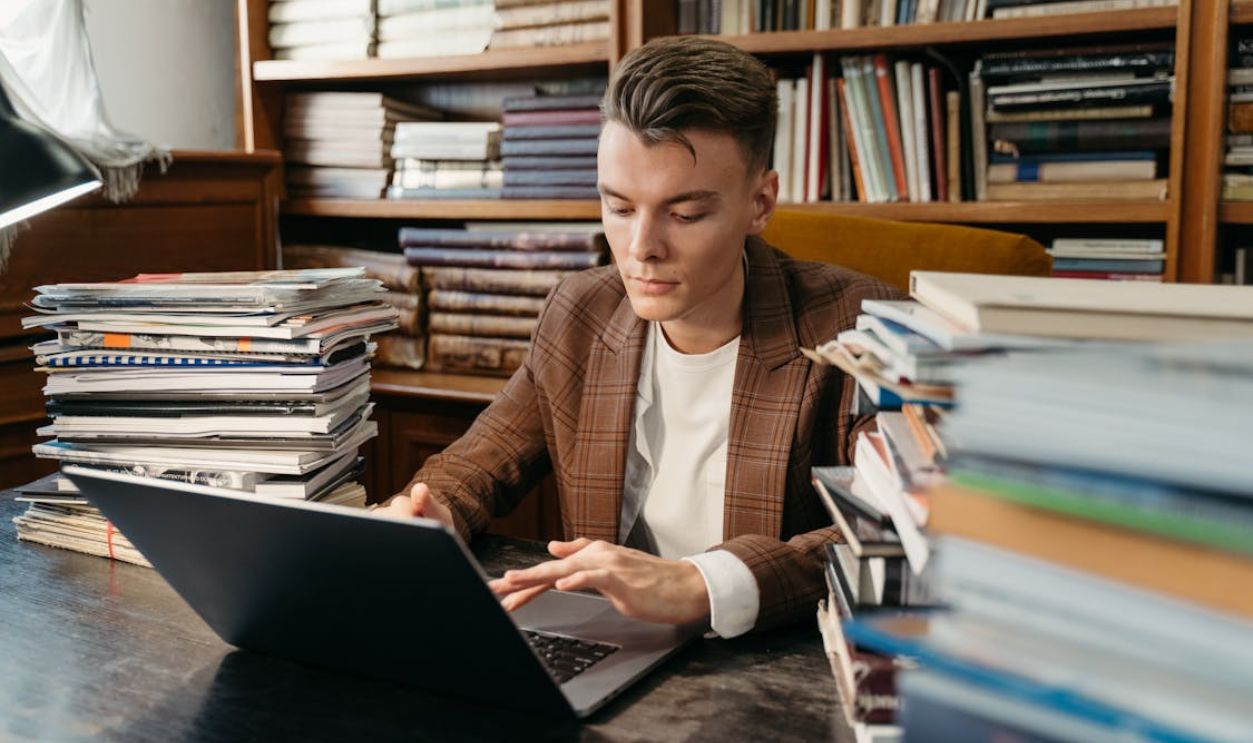 A Man using a Laptop