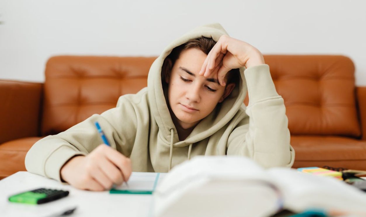 Young Man Studying at Home