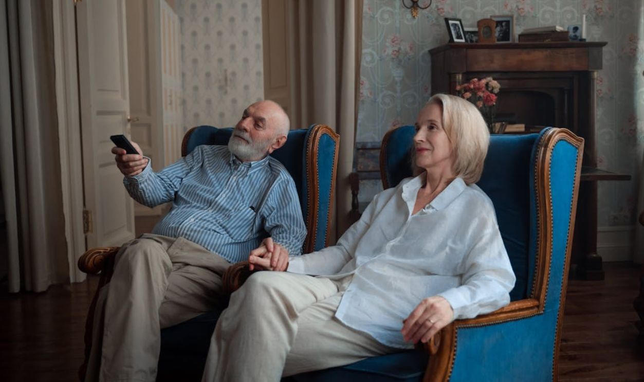 Couple Sitting on Chairs