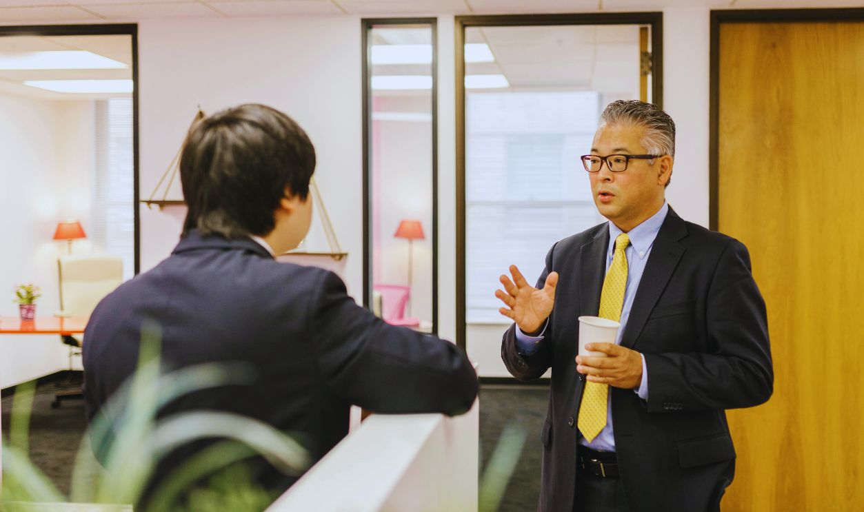 Men Having a Conversation