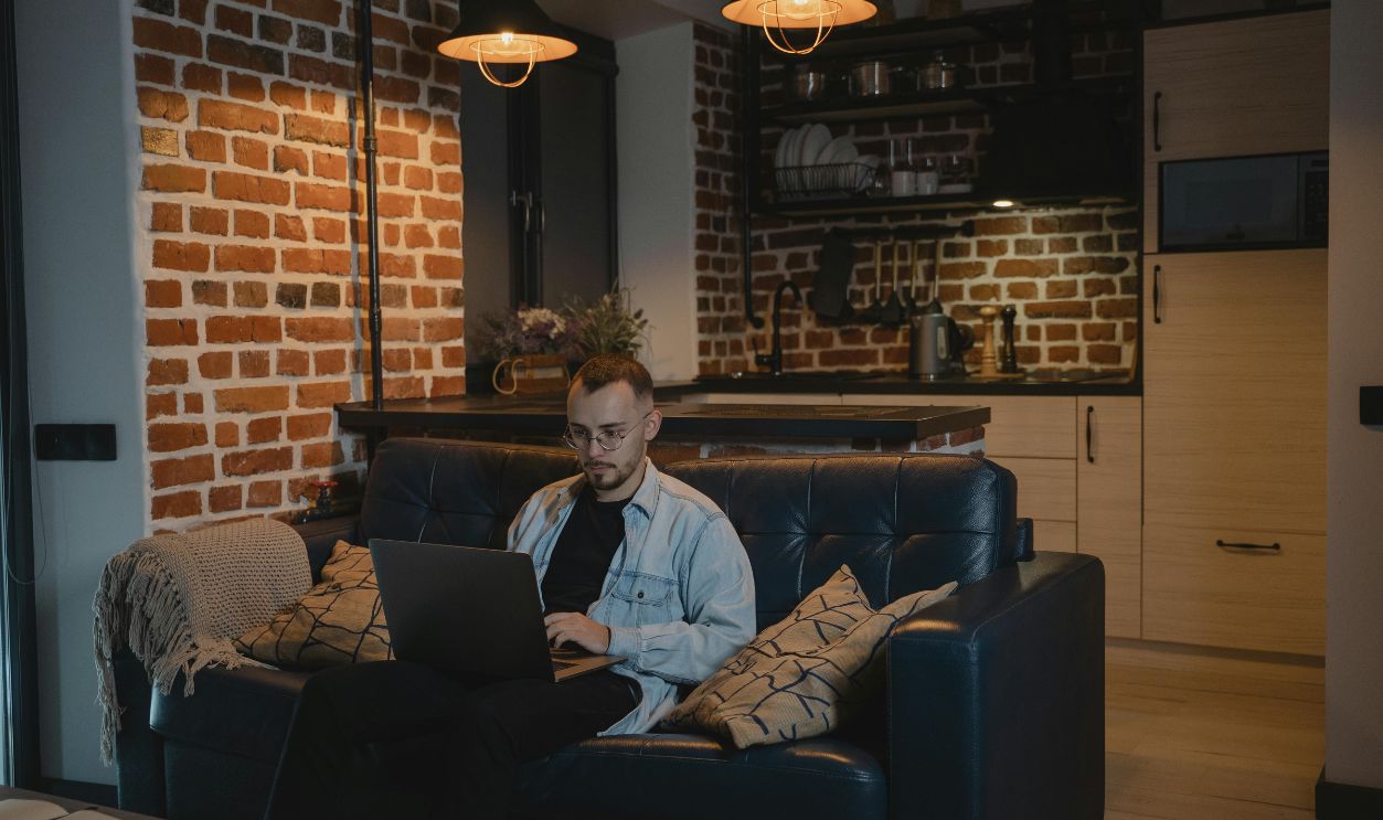 Focused Man Working on Laptop