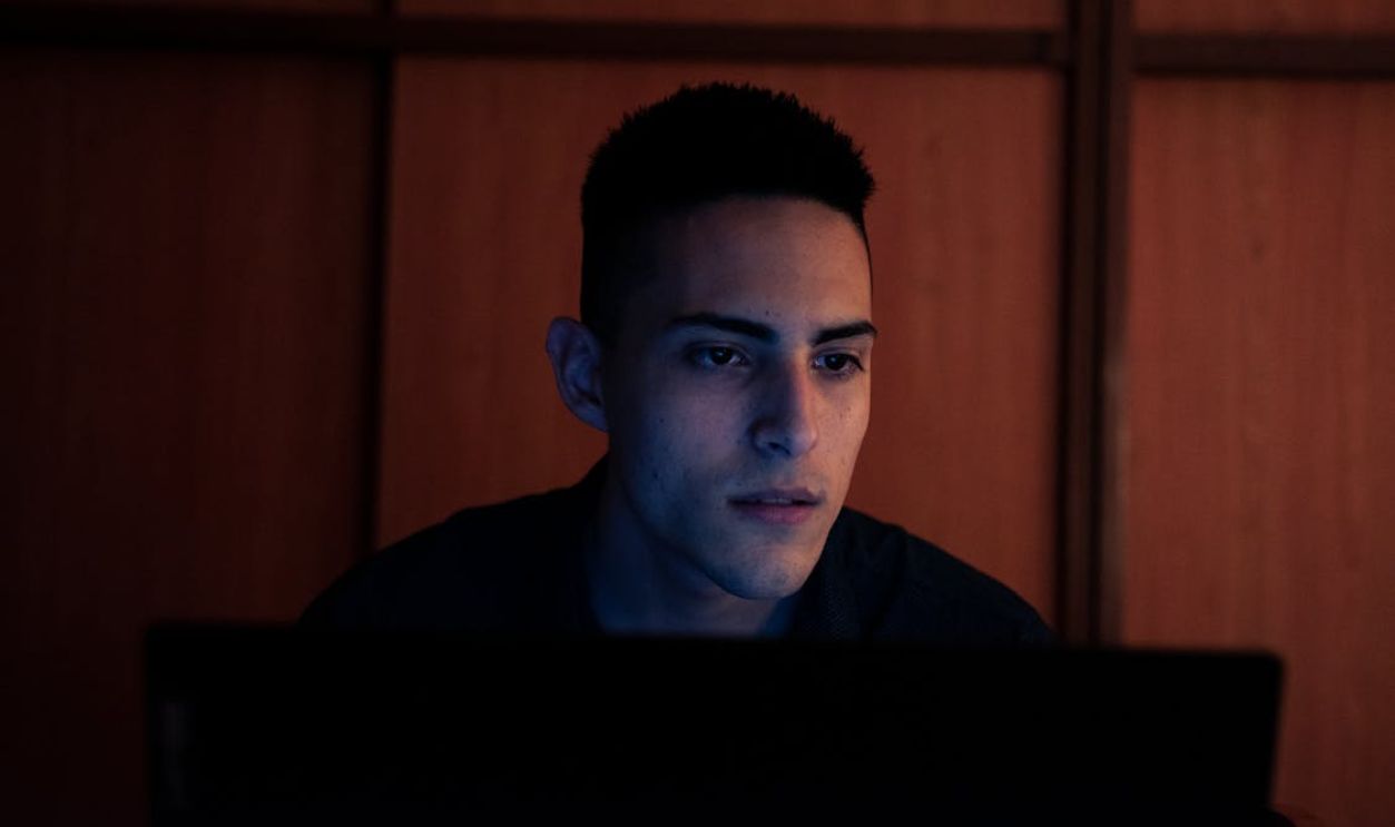 A Man Using a Laptop