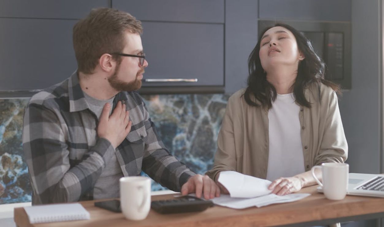 Stressed Couple Explaining Things to each Other