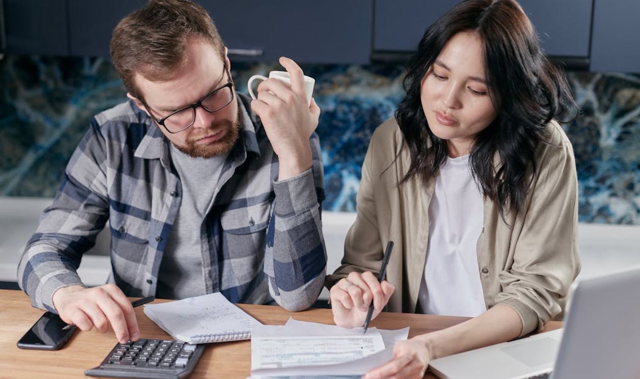 Couple Looking at their Bills