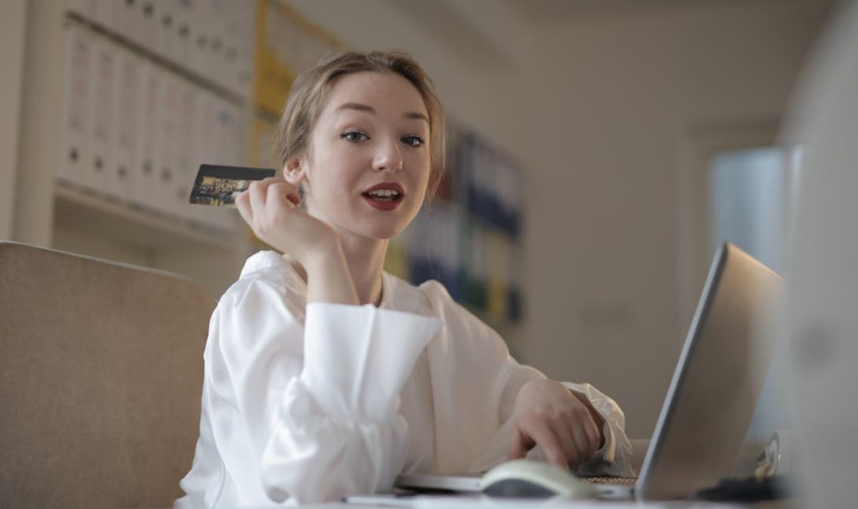 Woman holding a Credit Card