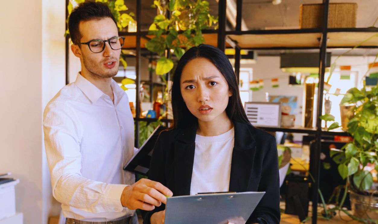 Confused Employee With Boss