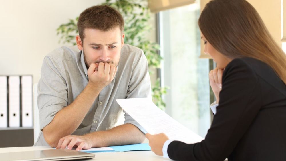 Portrait Photo of a man during a job interview in office