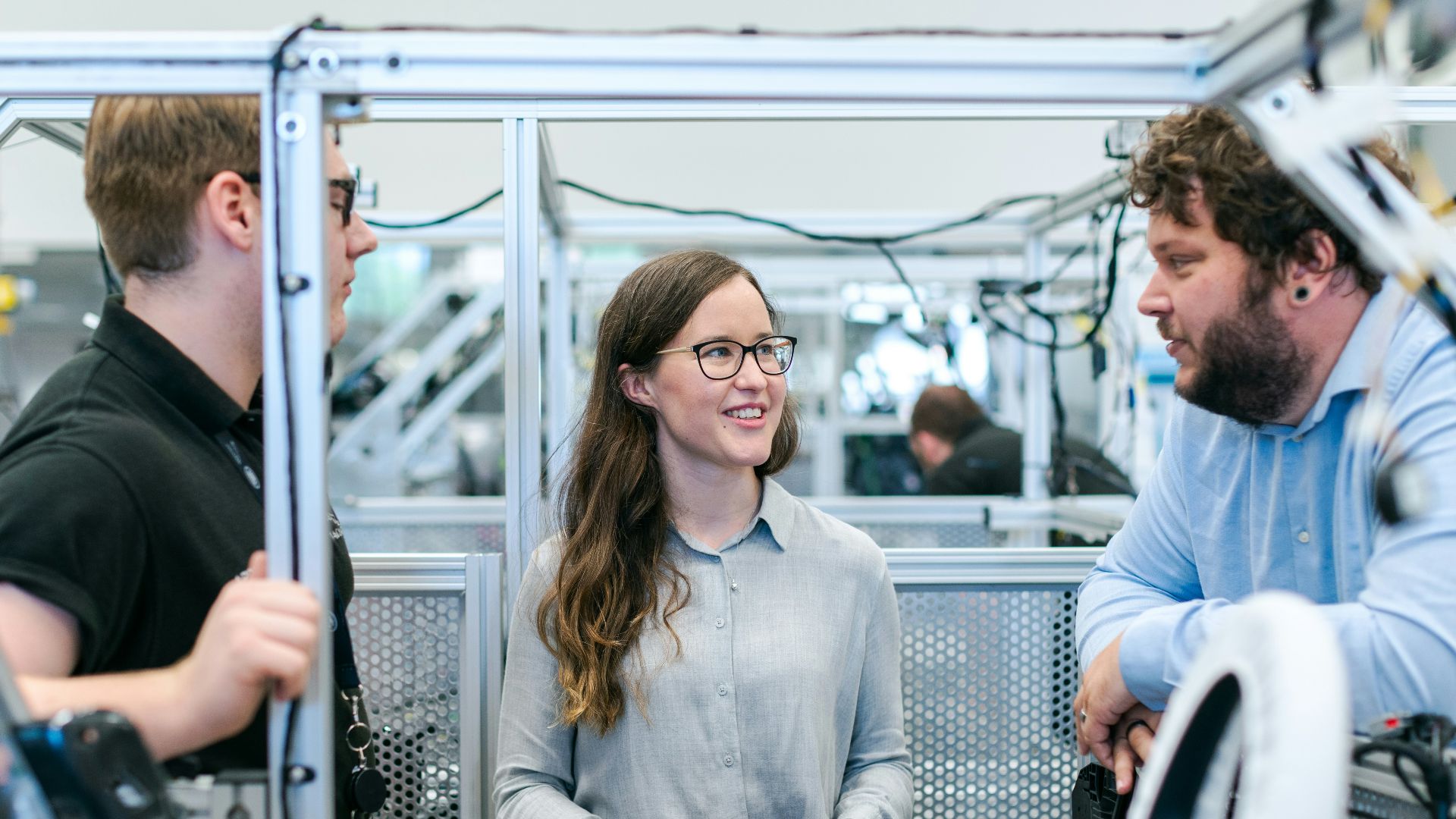 woman in white button up shirt wearing black framed eyeglasses