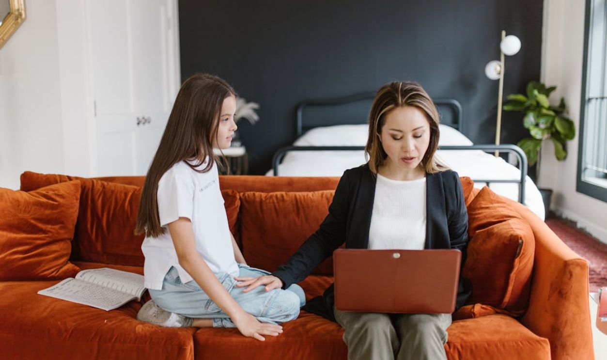Mother and Child Sitting on the Couch