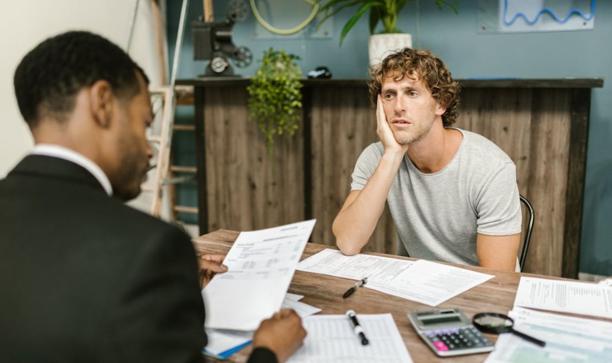 Men Sitting at the Table