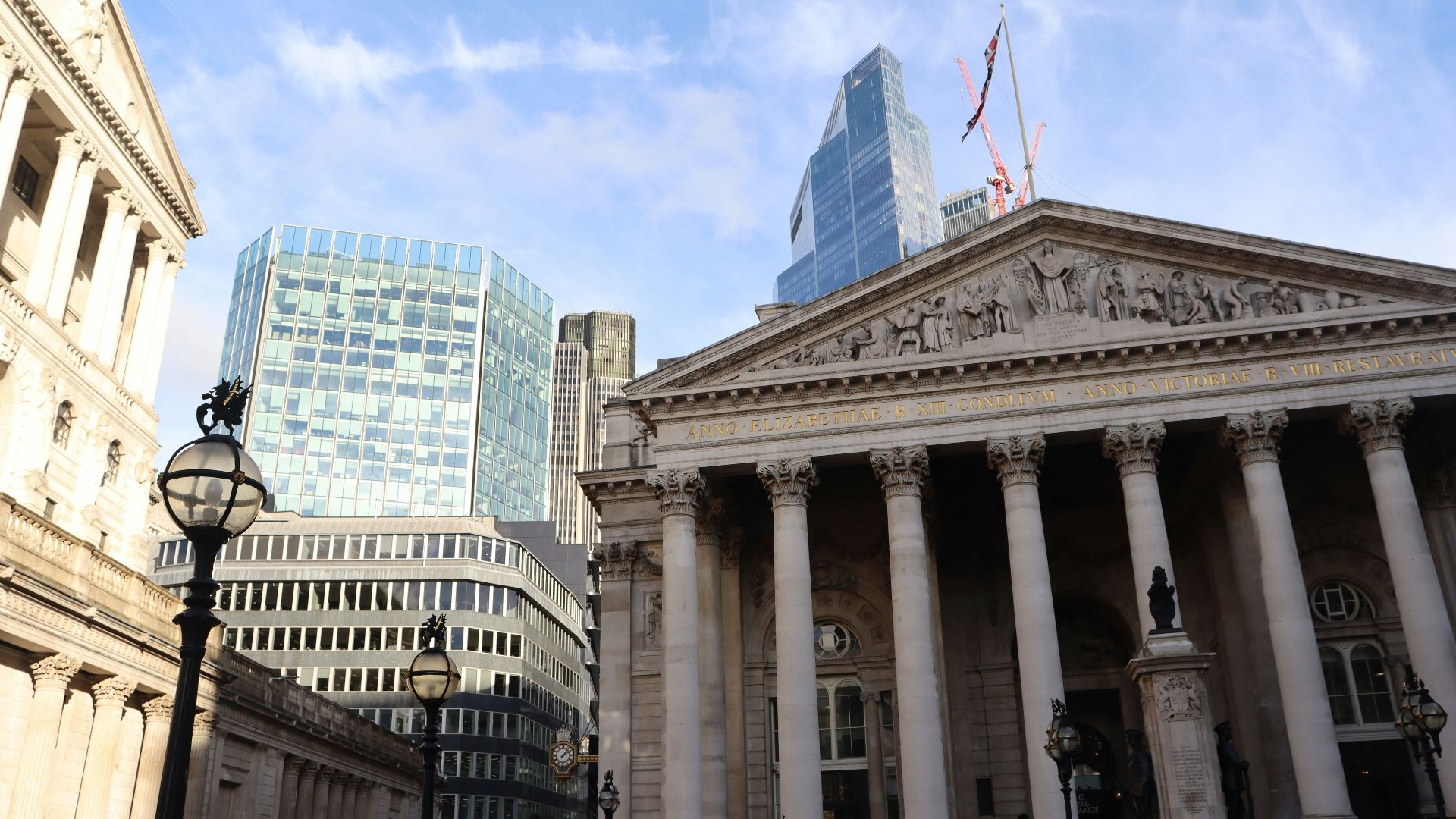 a building with columns and a flag
