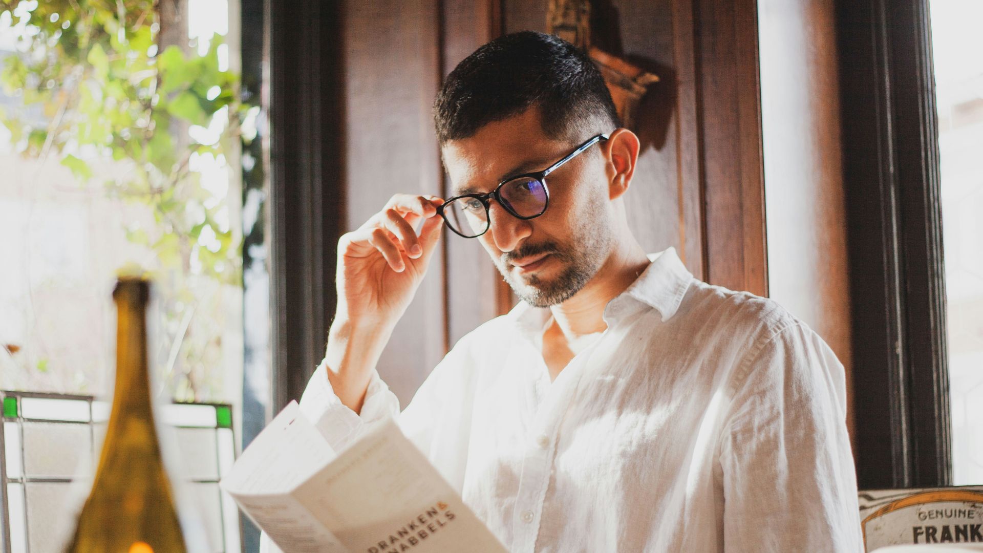 a man reading a newspaper