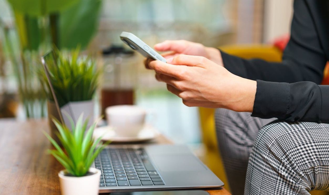 Cozy Home Office with Laptop and Smartphone